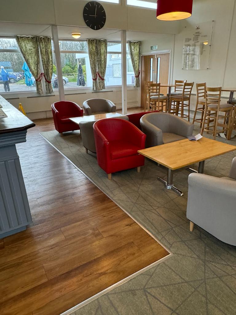 Karndean Van Gogh - Classic Oak at Came Down Golf Club with Brintons Quick Weave Carpet Lounge area